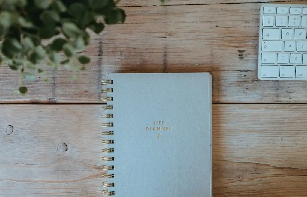 A calm, neutral planning workspace representing the SimplyVora Everyday Planner PDF bundle